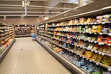 Many products in a grocery store aisle